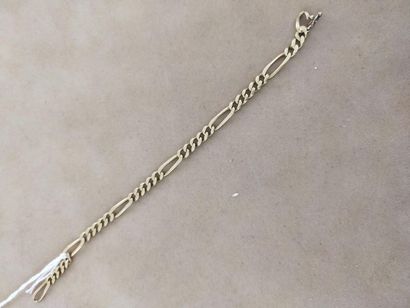 Gourmette en or jaune 18 k
Pd : 10, 14 g...