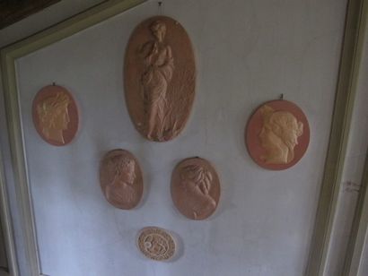 Set of five terracotta medallions, profile...