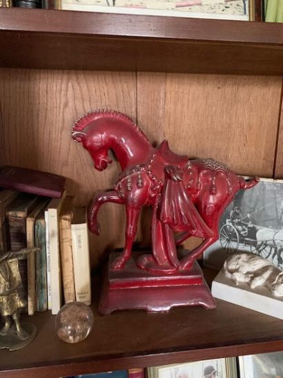 Modern horse statue in red enamelled sto...