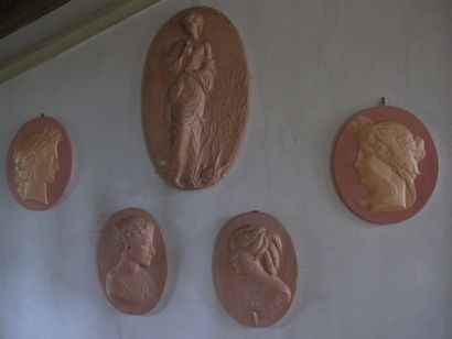 Set of five terracotta medallions, profile...