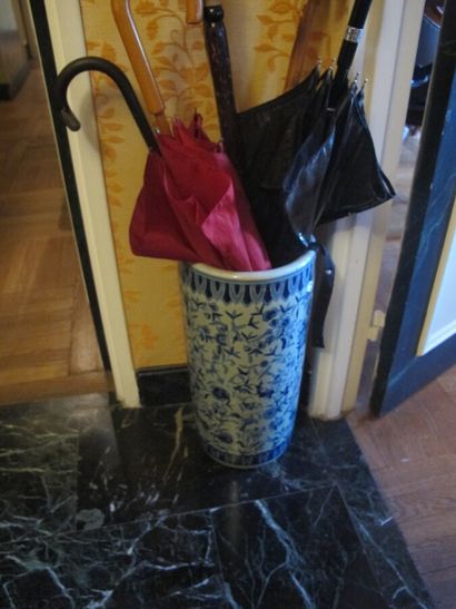 Porcelain umbrella holder with blue and white...