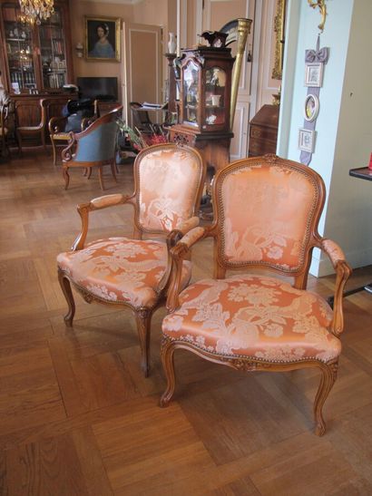 Pair of Louis XV style convertible armchairs

A...