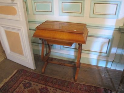 Work table made of light wood inlaid with...