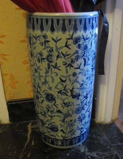 Porcelain umbrella holder with blue and white...