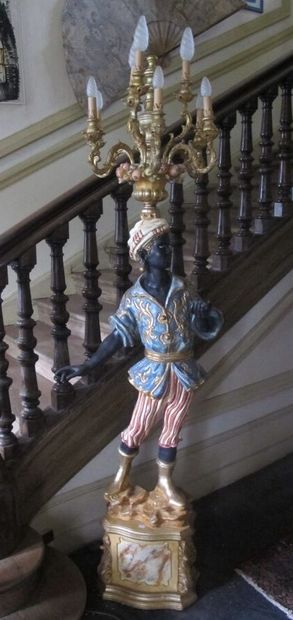 Torch door made of polychrome and gilded...