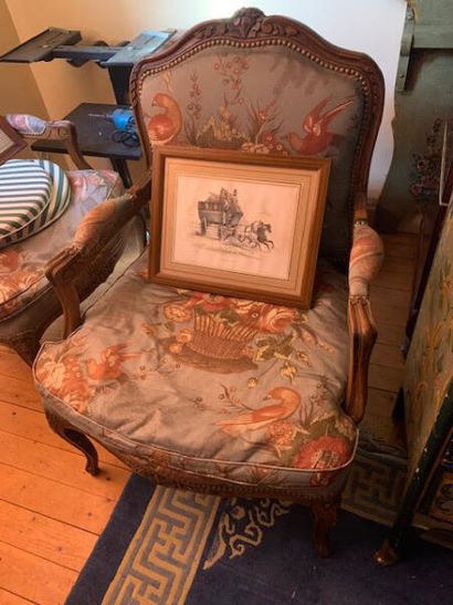 Pair of moulded and carved wooden armchairs...