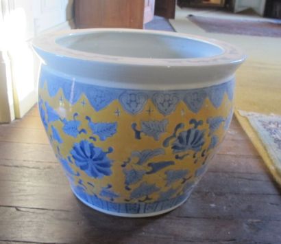 CHINA

Porcelain planter with blue and yellow...