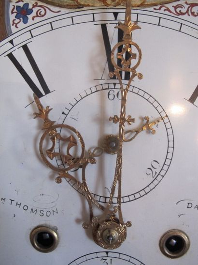 Parquet clock in natural wood, the enamelled...