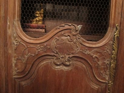 Oak cupboard with two latticed doors forming...
