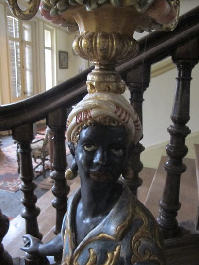 Torch door made of polychrome and gilded...