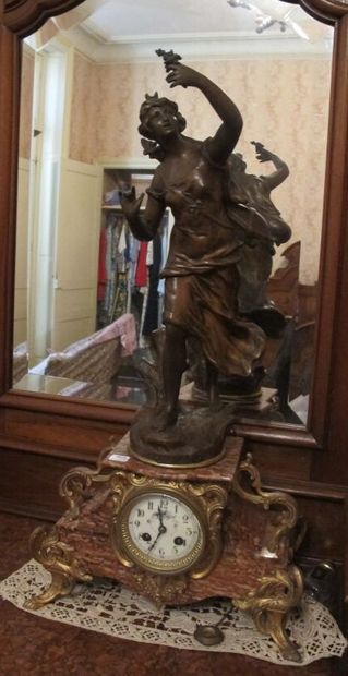 Fireplace set with a clock decorated with...