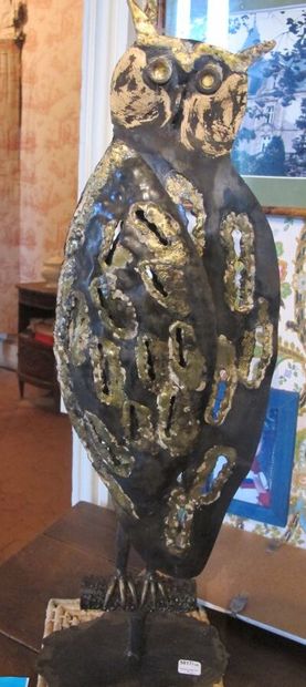 Two metal sculptures depicting a rooster...