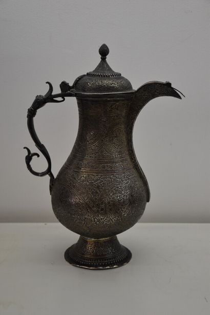 Ottoman silver jug chased with scrolls and...