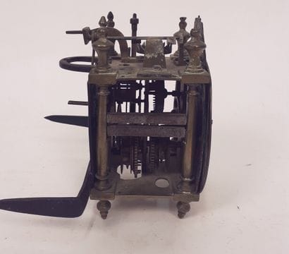 Metal clock movement

Inscribed on the dial...
