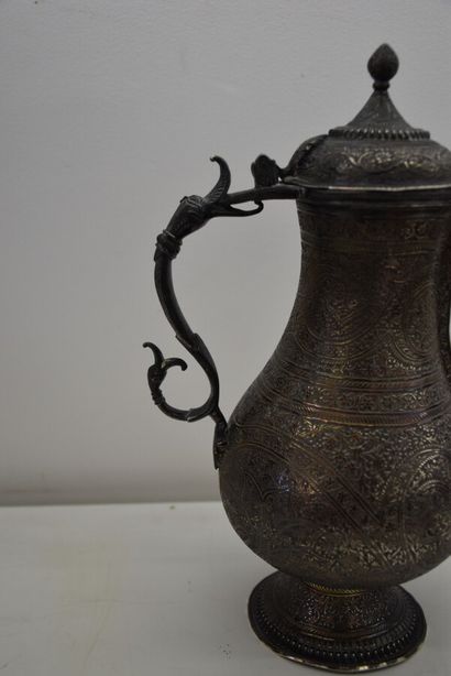 Ottoman silver jug chased with scrolls and...