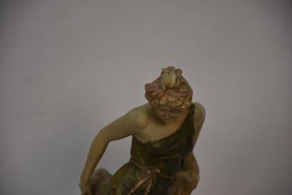 Polychrome ceramic vase with female figure

Royal...