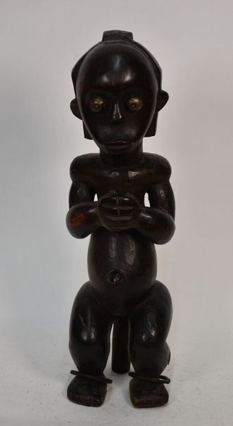 African statuette representing a female figure

Middle...