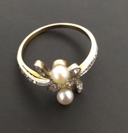 Lot of three 18K yellow and white gold rings...