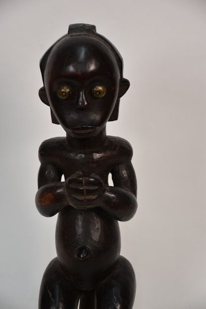 African statuette representing a female figure

Middle...