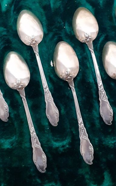 Twelve silver and vermeil coffee spoons with...