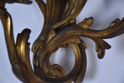 Two pairs of rocaille sconces in chased and...