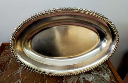 Three silver dishes: one round, two oval...