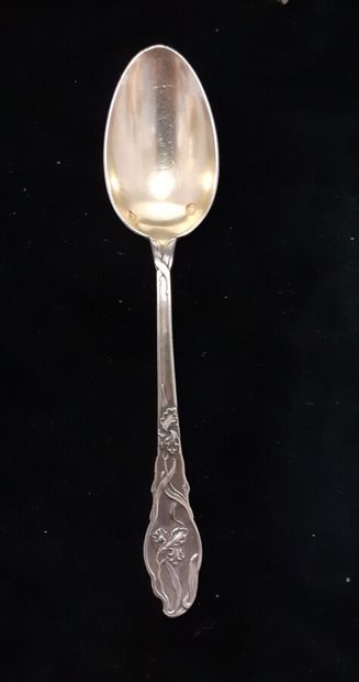 Twelve silver and vermeil coffee spoons with...