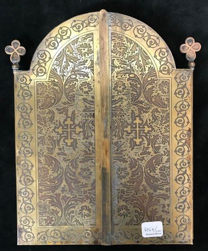 Triptych, travel icon in bronze opening on...