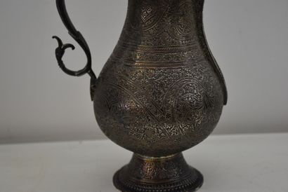 Ottoman silver jug chased with scrolls and...