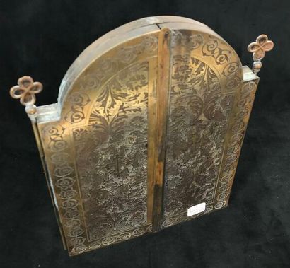 Triptych, travel icon in bronze opening on...