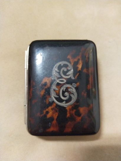Rectangular tortoise shell purse decorated...