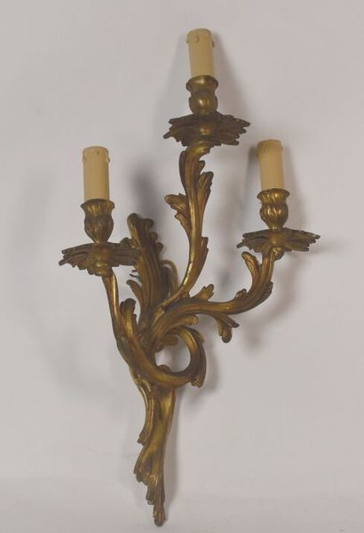 Two pairs of rocaille sconces in chased and...