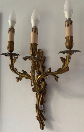 Two pairs of rocaille sconces in chased and...