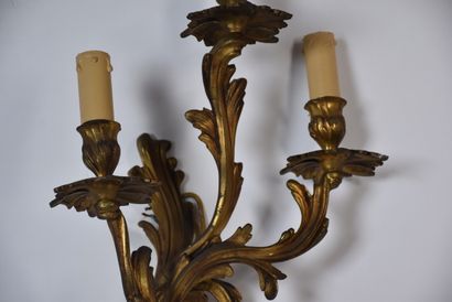 Two pairs of rocaille sconces in chased and...