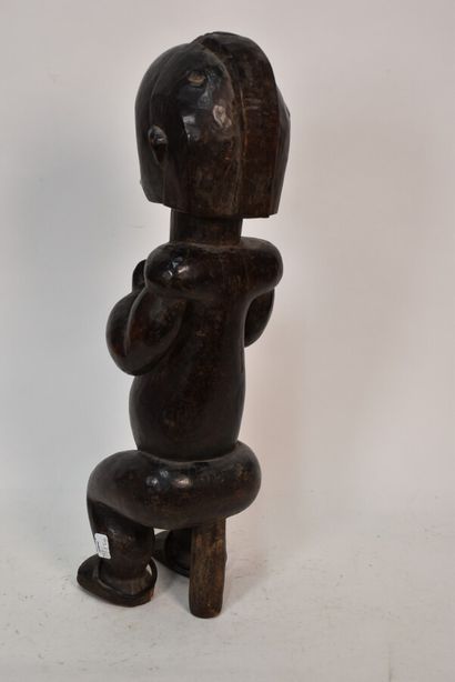 African statuette representing a female figure

Middle...