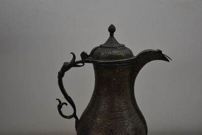 Ottoman silver jug chased with scrolls and...