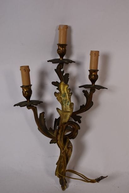 Two pairs of rocaille sconces in chased and...