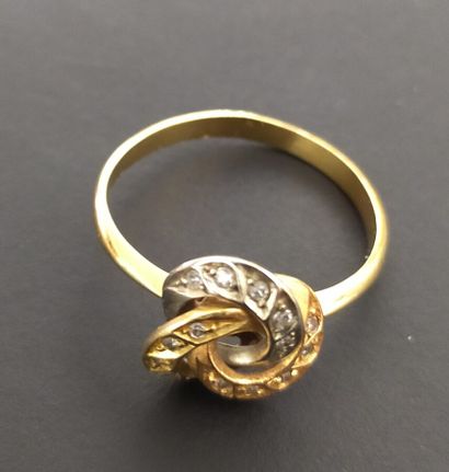 Lot of three 18K yellow and white gold rings...