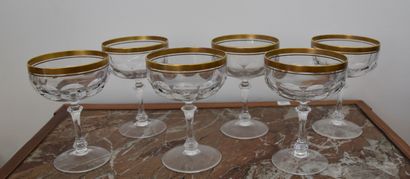 Six crystal glasses with gilded border decoration

H....