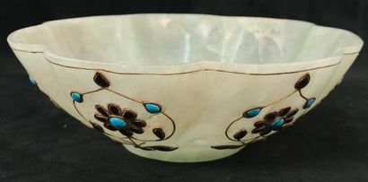A nephrite jade bowl of poly-lobed shape...