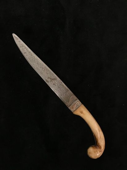 Small dagger called Khanjar. The handle is...