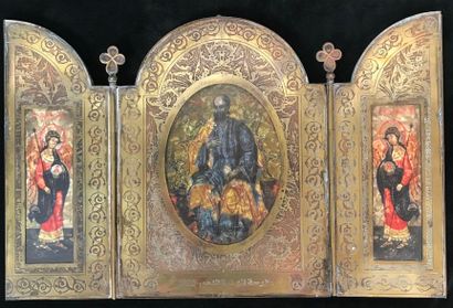 Triptych, travel icon in bronze opening on...