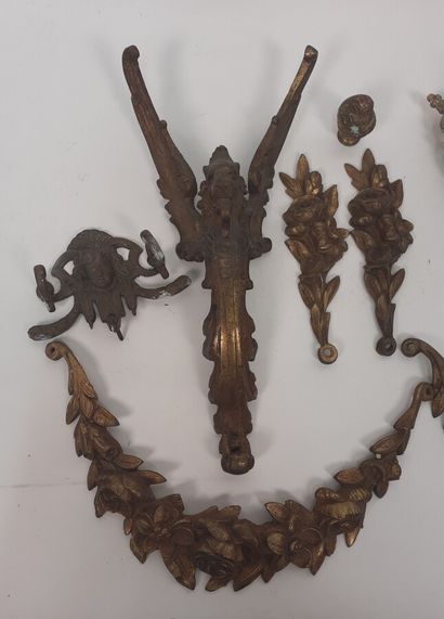 Set of seven decorative bronze elements



A...