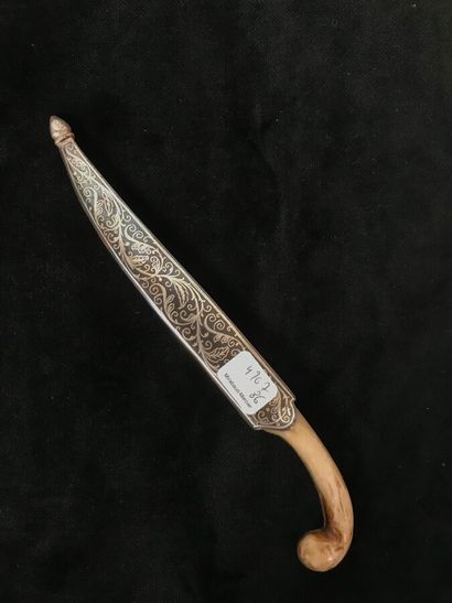 Small dagger called Khanjar. The handle is...