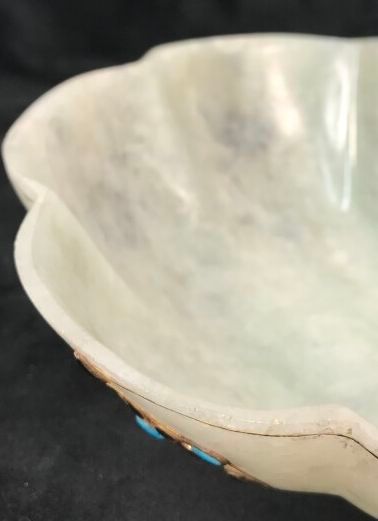 A nephrite jade bowl of poly-lobed shape...