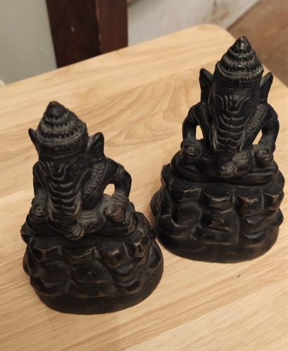 Pair of statuettes representing crouching...
