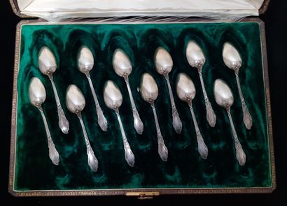 Twelve silver and vermeil coffee spoons with...