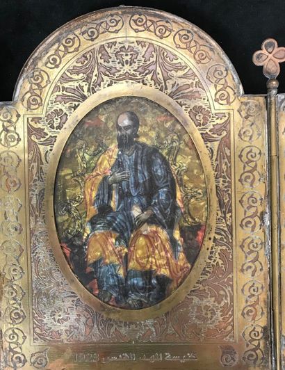 Triptych, travel icon in bronze opening on...