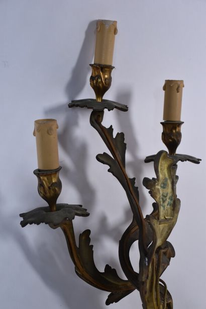 Two pairs of rocaille sconces in chased and...