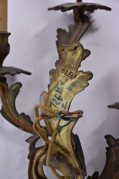 Two pairs of rocaille sconces in chased and...